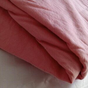 Really big piece of fabric pale rose 100% cotton. Dimensions: 110 x 144 inches.